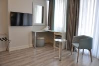 TV a/nebo společenská místnost v ubytování Centrum Suites İstanbul