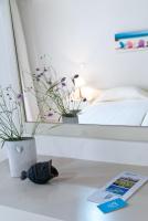 Postel nebo postele na pokoji v ubytování Magia Apartments