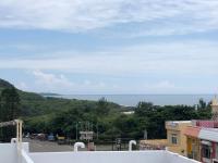 a view of the ocean from a building at 海的墾丁旅店 Ocean KT Inn in Kenting