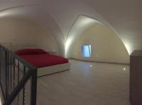 A bed or beds in a room at B&B MARIO PAGANO