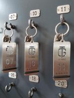 a bunch of key chains with numbers on them at Hotel Ty Gwenn La Baule in La Baule