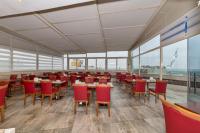 A restaurant or other place to eat at Marcello Hotel