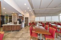 A restaurant or other place to eat at Marcello Hotel