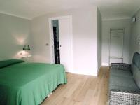 Postel nebo postele na pokoji v ubytování B&B "Madama Granèt"
