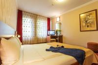 A bed or beds in a room at Hotel Villa Boyana - Free Parking