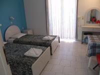 Postel nebo postele na pokoji v ubytování Kontessa Apartments