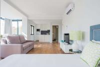 Postel nebo postele na pokoji v ubytování 137 LuxResidence