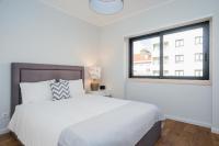 Postel nebo postele na pokoji v ubytování 137 LuxResidence