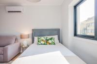 Postel nebo postele na pokoji v ubytování 137 LuxResidence