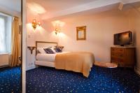 Una cama o camas en una habitaci&oacute;n de Le Clos d&#39;Amboise