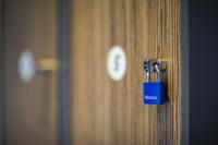 a door with a lock on a wooden door at Kick Ass Greyfriars (18+) in Edinburgh