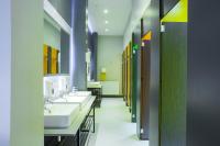 a row of sinks in a public bathroom at Kick Ass Greyfriars (18+) in Edinburgh