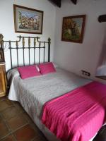 Hotel Posada del Bandoleroにあるベッド