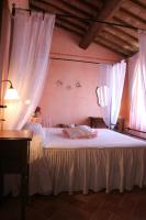 Posteľ alebo postele v izbe v ubytovaní Agriturismo Renaccino