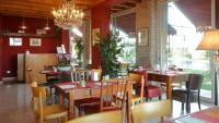 Reštaurácia alebo iné gastronomické zariadenie v ubytovaní Le Greghe Suites