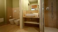 Kúpeľňa v ubytovaní Le Greghe Suites