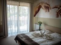 Łóżko lub łóżka w pokoju w obiekcie Hotel Vitalia