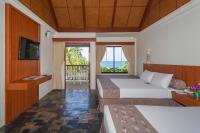 Postel nebo postele na pokoji v ubytování Karona Resort & Spa - SHA Extra Plus