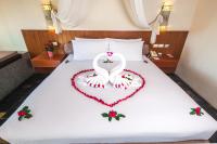 Postel nebo postele na pokoji v ubytování Karona Resort & Spa - SHA Extra Plus