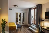 Postel nebo postele na pokoji v ubytování Halo Boutique Hotel