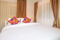 Postel nebo postele na pokoji v ubytování Aonang Sweet Pool Villa