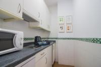 Kuchyň nebo kuchyňský kout v ubytování Apartamentos Boutique Vida