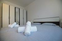 Posteľ alebo postele v izbe v ubytovaní Apartman Reno
