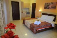 Postel nebo postele na pokoji v ubytování Faros Luxury Suites