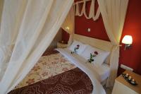 Postel nebo postele na pokoji v ubytování Faros Luxury Suites