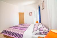 Posteľ alebo postele v izbe v ubytovaní Apartments Đurđa