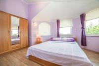 Posteľ alebo postele v izbe v ubytovaní Apartments Đurđa