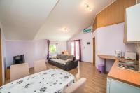 Posteľ alebo postele v izbe v ubytovaní Apartments Đurđa