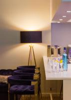 a group of wine glasses sitting on a counter at Lutecia Smart Design Hotel in Lisbon