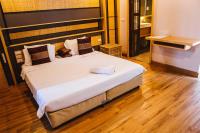 Postel nebo postele na pokoji v ubytování Paragon Inn