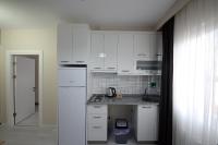Kuchyň nebo kuchyňský kout v ubytování city59 Suit Otel