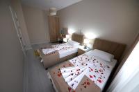 Postel nebo postele na pokoji v ubytování city59 Suit Otel