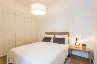 Postel nebo postele na pokoji v ubytování FLH Restauradores Charming Apartment