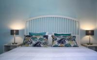 A bed or beds in a room at VILLA OLIVEIRA by Buenavilla