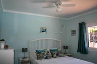 A bed or beds in a room at VILLA OLIVEIRA by Buenavilla