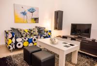 TV a/nebo společenská místnost v ubytování Apartamento Moderno