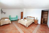 Postel nebo postele na pokoji v ubytování Azienda Agrituristica Le Terre Di San Leonardo