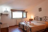 Postel nebo postele na pokoji v ubytování Azienda Agrituristica Le Terre Di San Leonardo