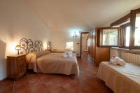 Postel nebo postele na pokoji v ubytování Azienda Agrituristica Le Terre Di San Leonardo