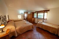 Postel nebo postele na pokoji v ubytování Azienda Agrituristica Le Terre Di San Leonardo