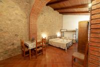 Postel nebo postele na pokoji v ubytování Azienda Agrituristica Le Terre Di San Leonardo