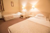 Posteľ alebo postele v izbe v ubytovaní Arena Hotel Spa & Wellness