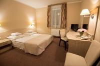 Posteľ alebo postele v izbe v ubytovaní Arena Hotel Spa & Wellness