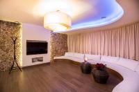Televízia a/alebo spoločenská miestnosť v ubytovaní Arena Hotel Spa & Wellness