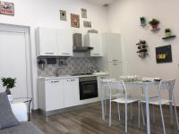 A kitchen or kitchenette at Perla Marina