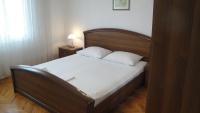 Postel nebo postele na pokoji v ubytování Apartments and Rooms Denis